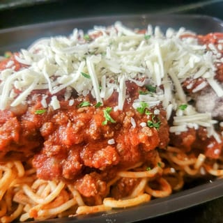 Spaghetti & Meatballs smothered in Our Homemade Meaty Sauce